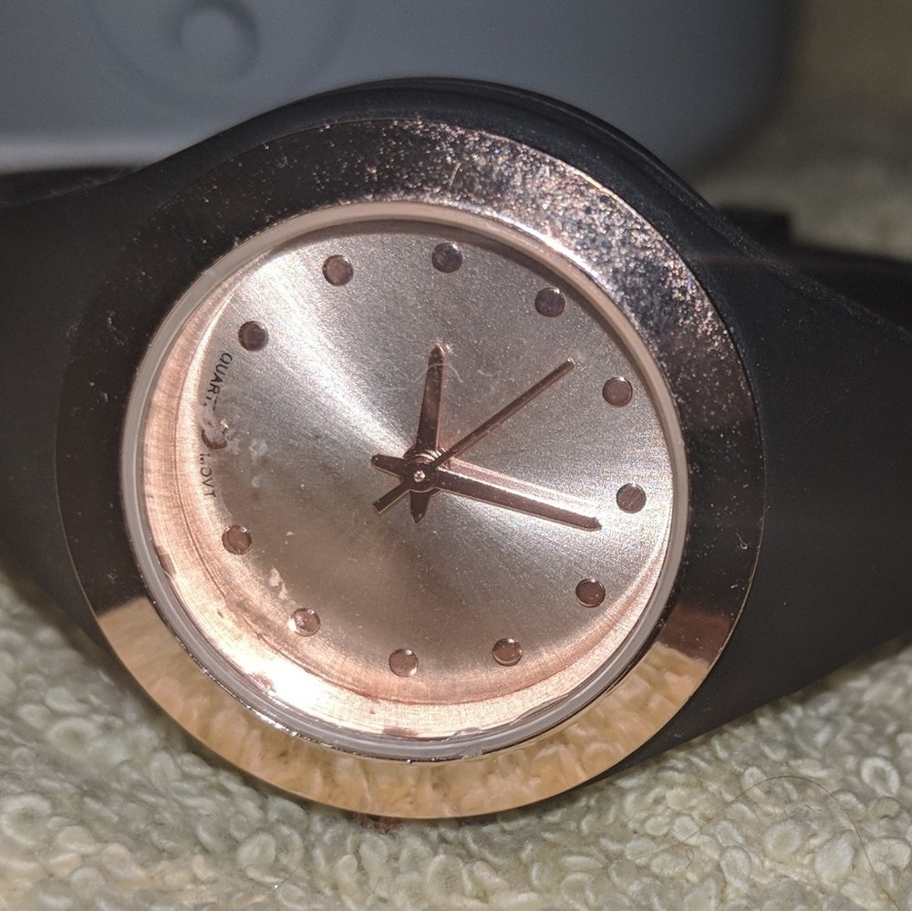 Rose gold and black watch